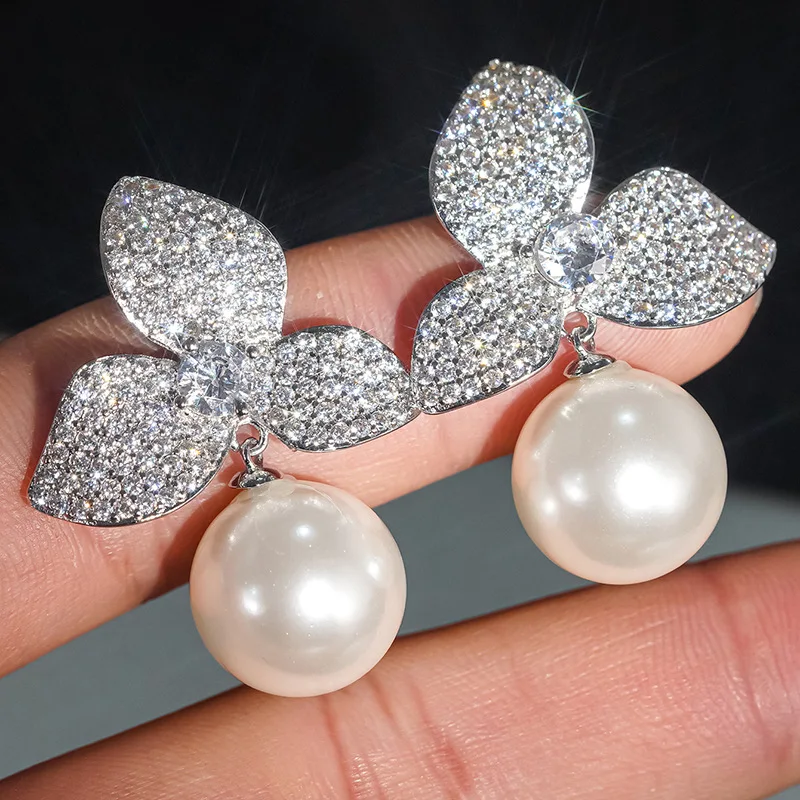 2026 New European and American New Fashionable Pearl Earrings for Women Attending Banquets with Inlaid Zircon Accessories