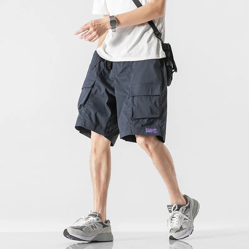 2025 verão novo casual workwear shorts de secagem rápida para homens com bolsos grandes cobertos, fivela elástica multifuncional w