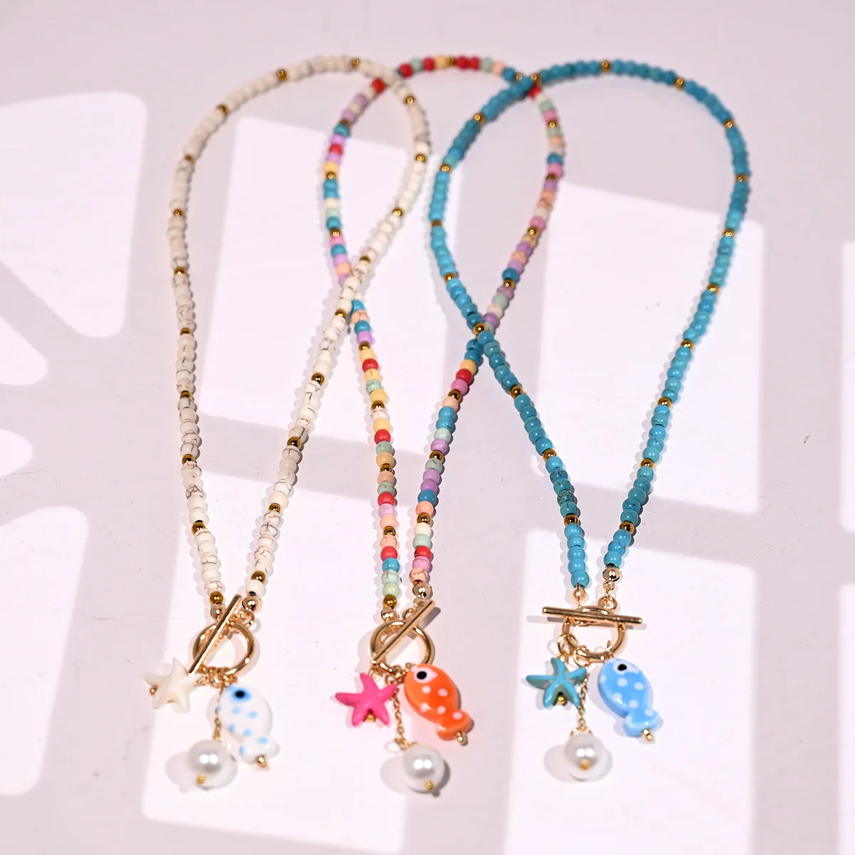ZAKOL Bohemian Sea-Inspired Ceramic Fish & Starfish Pendant Necklace Dopamine Rainbow Color Beads Necklaces Beach Jewelry image 4