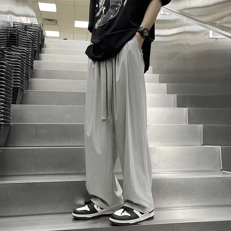 

Мужские летние повседневные брюки свободного кроя с широкими штанинами из ледяного шелка, быстросохнущие, спортивные, длинные, молодежные, модные, прямые, из полиэфирного волокна