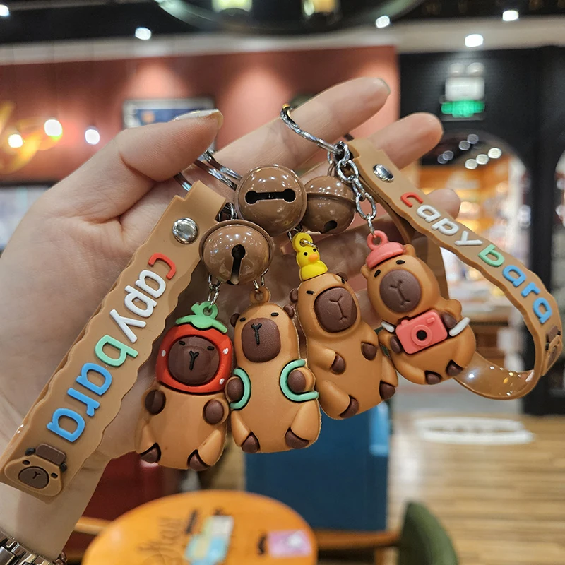 

Cartoon Kapibala Small Bell PVC Keychain Doll Toy Key Ring Bags Pendant Decoration Earphone Cover Accessories Gift