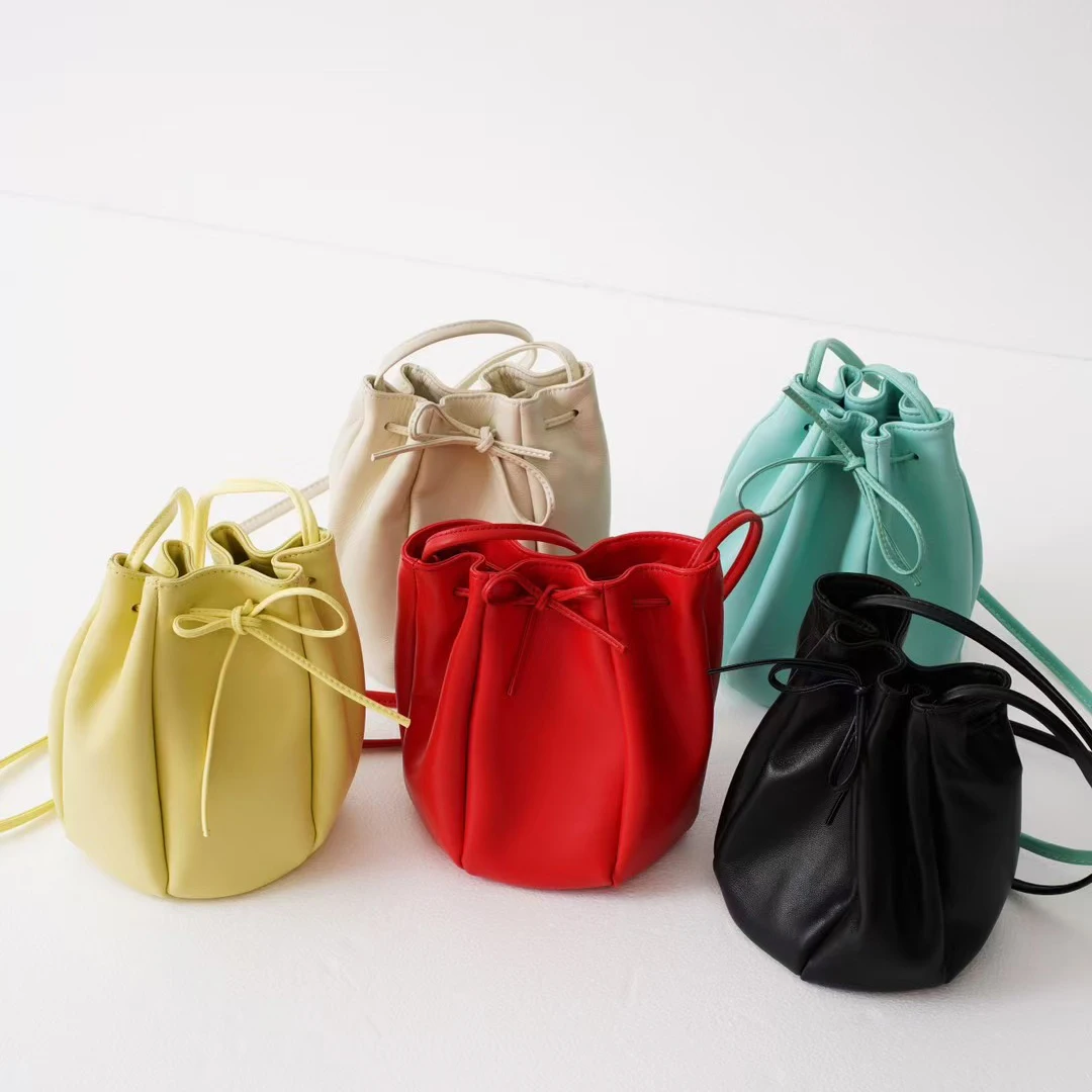 Sheepskin drawstring bucket bag 2025 new spring niche design genuine leather shoulder bag soft women's mini yellow crossbody bag - Image 3