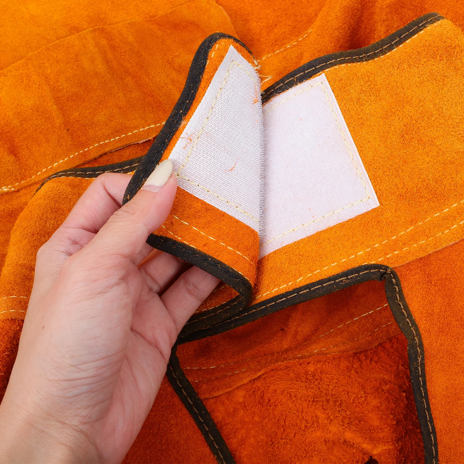 Saldatura Arancione Resistente all'usura Pelle bovina Saldatore Tuta Isolamento termico Anti-scottatura Abbigliamento da lavoro Saldatura Sicurezza