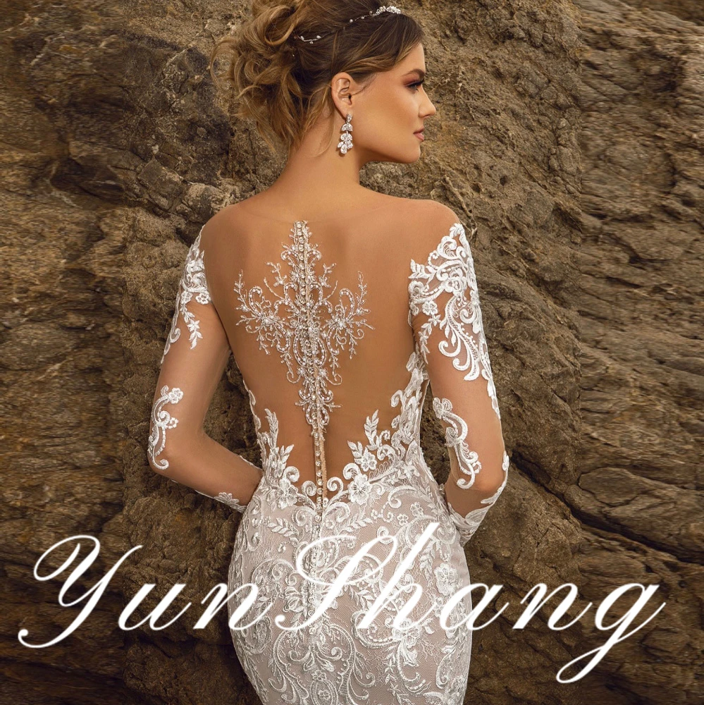 YunShang Customized Romantic Long Sleeve Intricately Embroidered Lace V Neck Mermaid Wedding Dress with Graceful Sheer Back Sexy