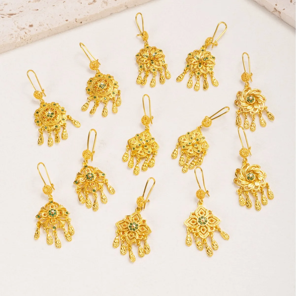 9999 gold Xinjiang ethnic style stud earrings with exotic charm, Middle East Dubai imperial fringed earrings, and West Sichuan