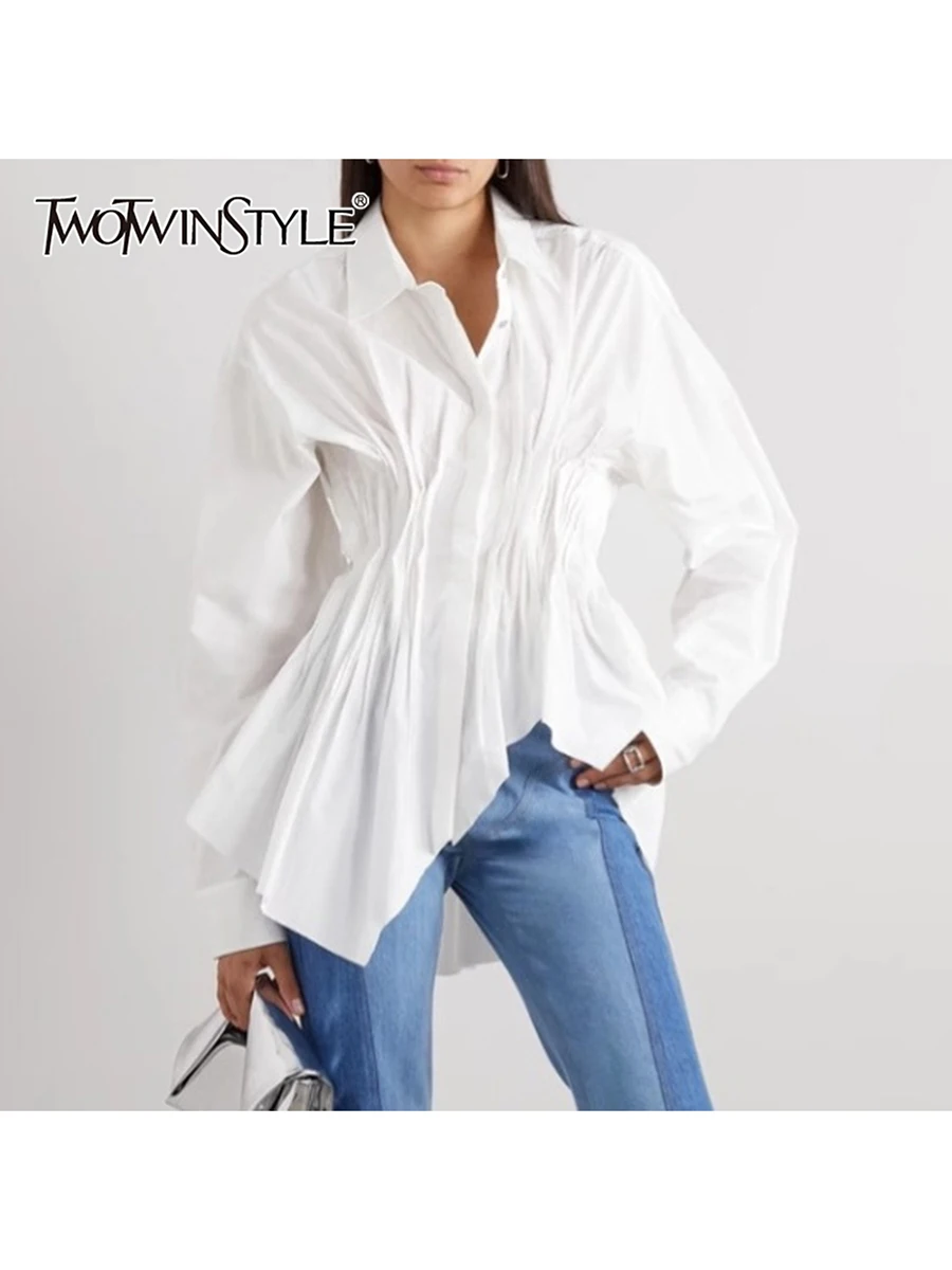TWOTWINSTYLE Fashion Spliced Folds Irregular Shirts for Women Lapel Long Sleeves Patchwork Single Breasted Shirt Female Clothing