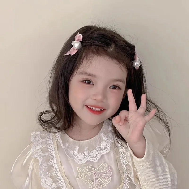 ใหม่หวานโบว์ไข่มุกผมคลิปสําหรับเด็กผู้หญิงสีชมพู Bowknot เจ้าหญิงด้านคลิป Bangs คลิปเด็ก Barrettes อุปกรณ์เสริมผม