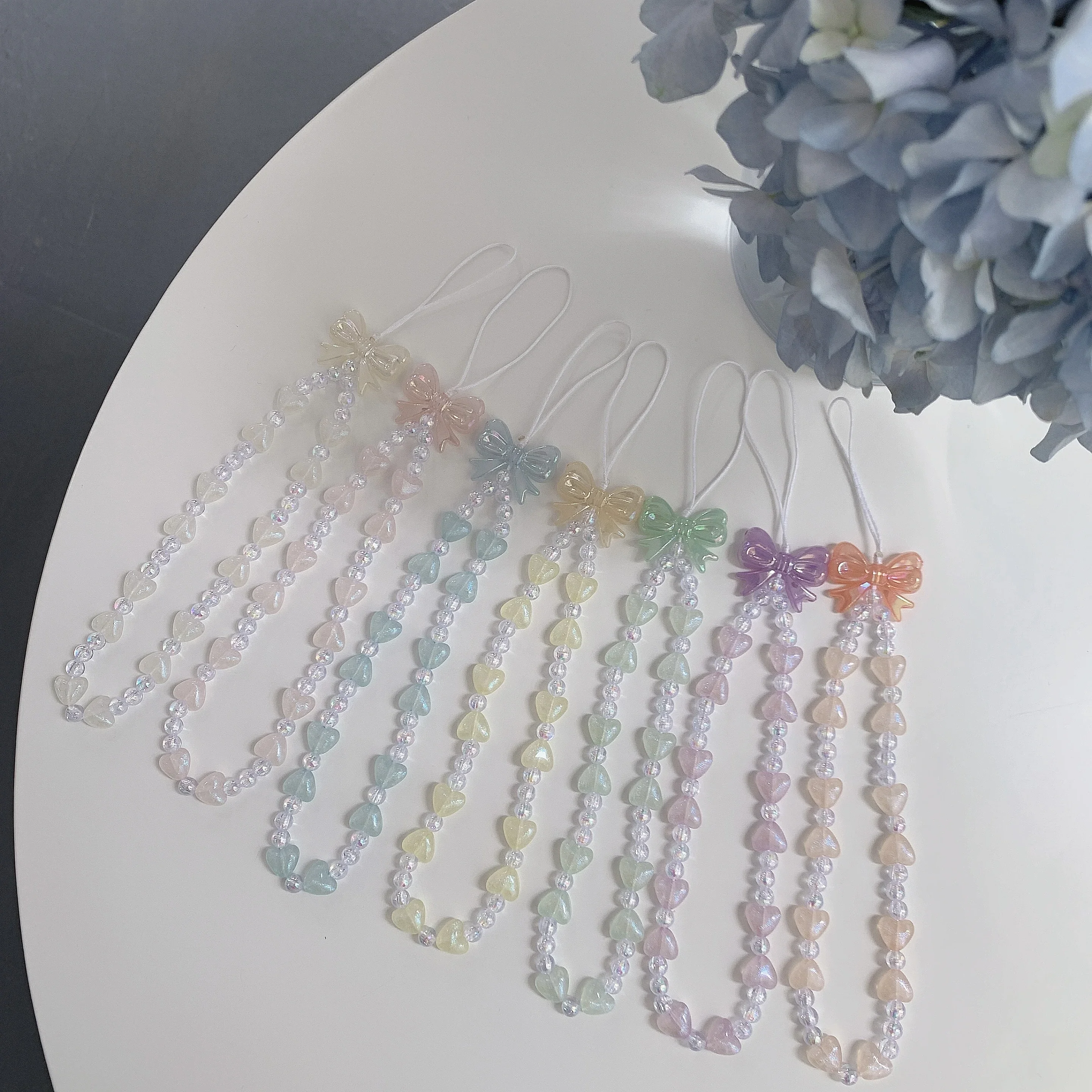 

Fashion Heart Beaded Bowknot Pearl Beaded Delicate Lanyard Anti Lost Mobile Phone Chain for Female Charming Jewelry Accessories
