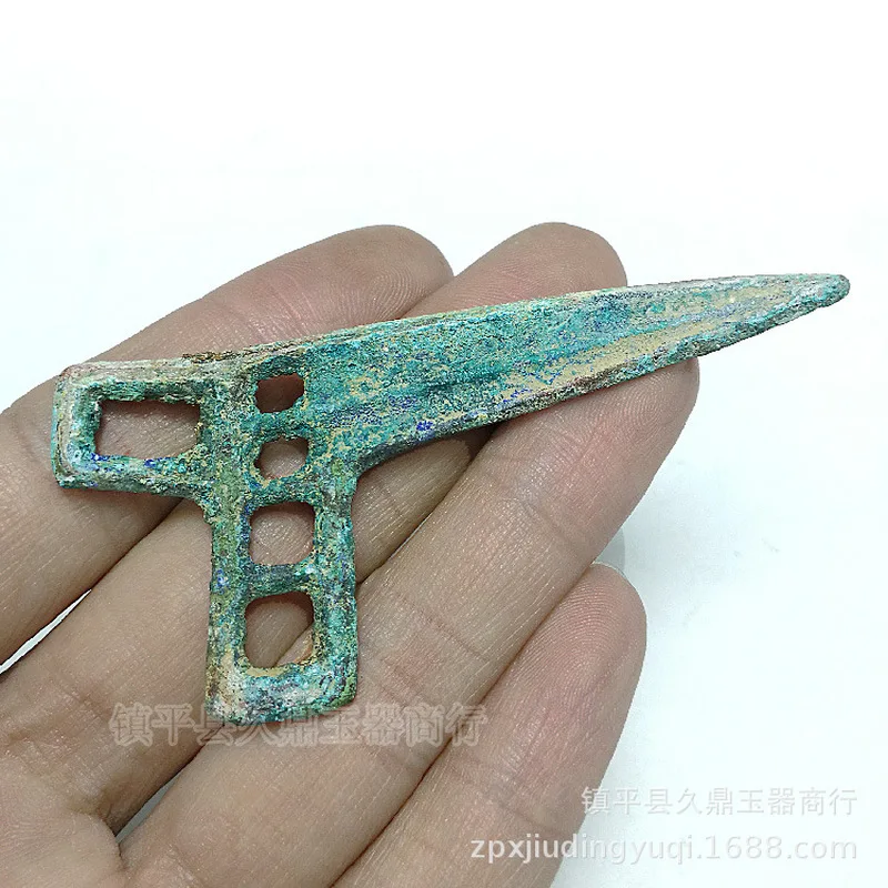 coins, antiques, miscellaneous items, and aged bronze artifacts