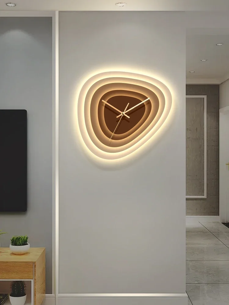 Light luxury living room creative clock wall lamp abstract dining room clock hanging picture modern