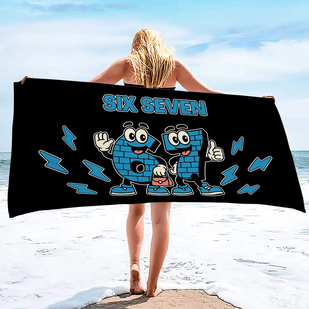 A soft and absorbent travel towel the bathroom featuring a blue cartoon lightning bolt pattern printed on microfiber fabric
