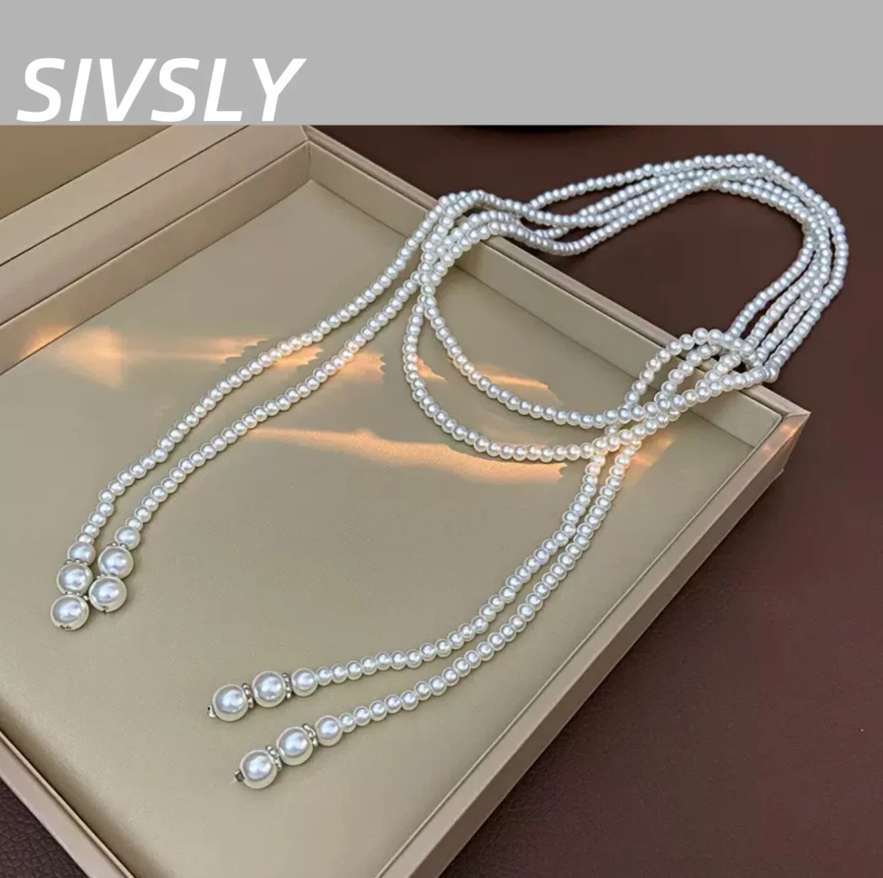 

Luxury design pearl necklace for women, long style, high-end feeling, fashionable collar chain, pearl cardigan chain, simple