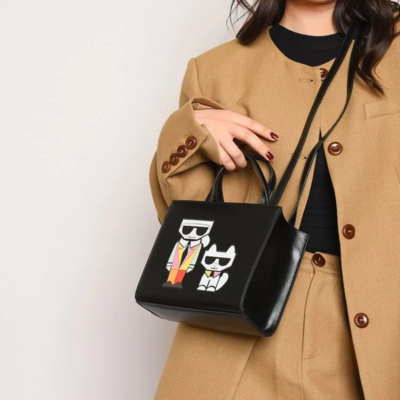 2025 Nuova borsa tote in tela Borsa a tracolla semplice Borsa da pranzo portatile Borsa da donna portatile di grande capacità