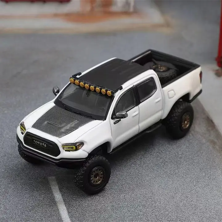 

Spot GCD 1:64 Toyota Tacoma Tacoma 3-го поколения N300 Модифицированная модель автомобиля из сплава с широким кузовом