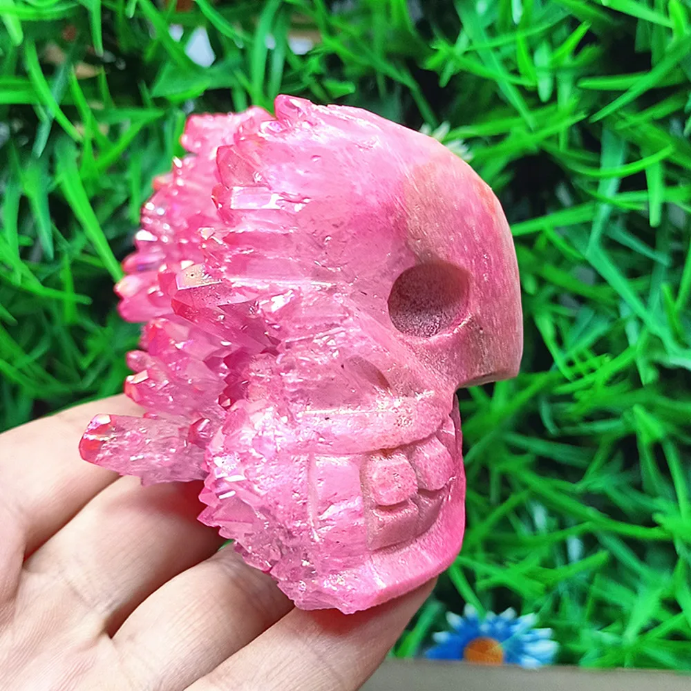 Natural quartz crystal coated with crystal, hand-carved skull. Home decoration, decorative piece, chakra.