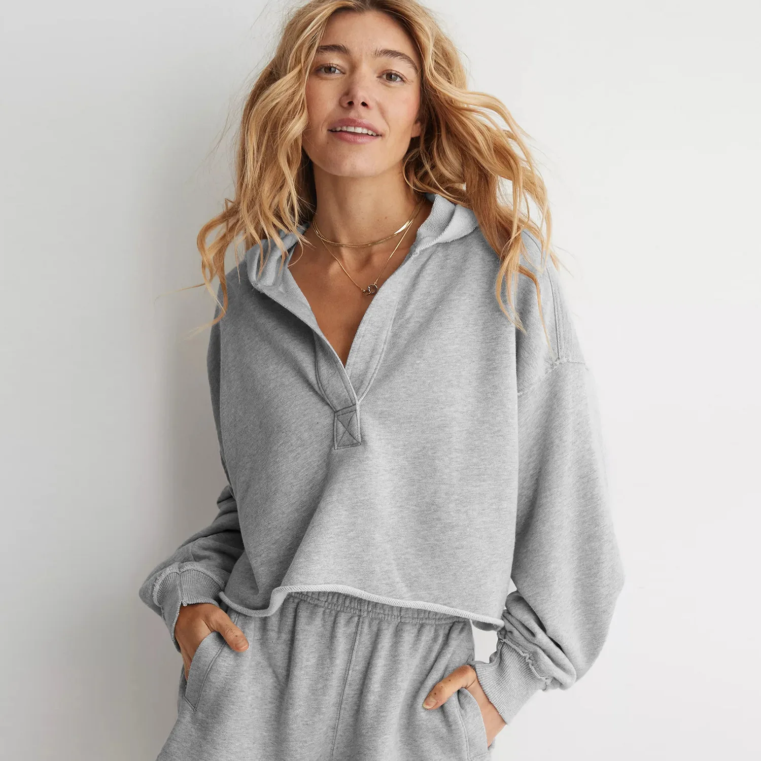 

2025 Spring and autumn European and American fashion loose trendy hooded sweatshirt women V-neck top long sleeve pullover