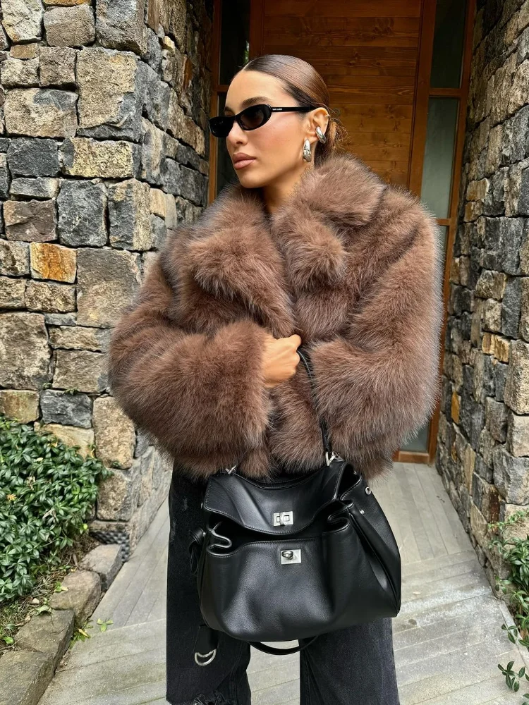 Abrigo de piel sintética de Color liso para mujer, chaqueta holgada y cálida de manga larga con solapa a la moda, prendas de vestir exteriores elegantes para uso diario, novedad de 2025