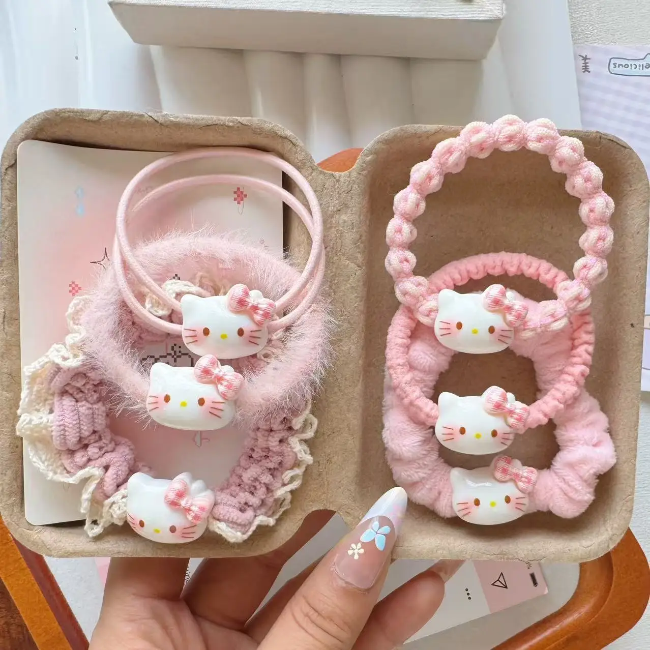 

Cute pink bow KT cat hair band autumn and winter plush cartoon rubber band super cute girl couple student hair rope