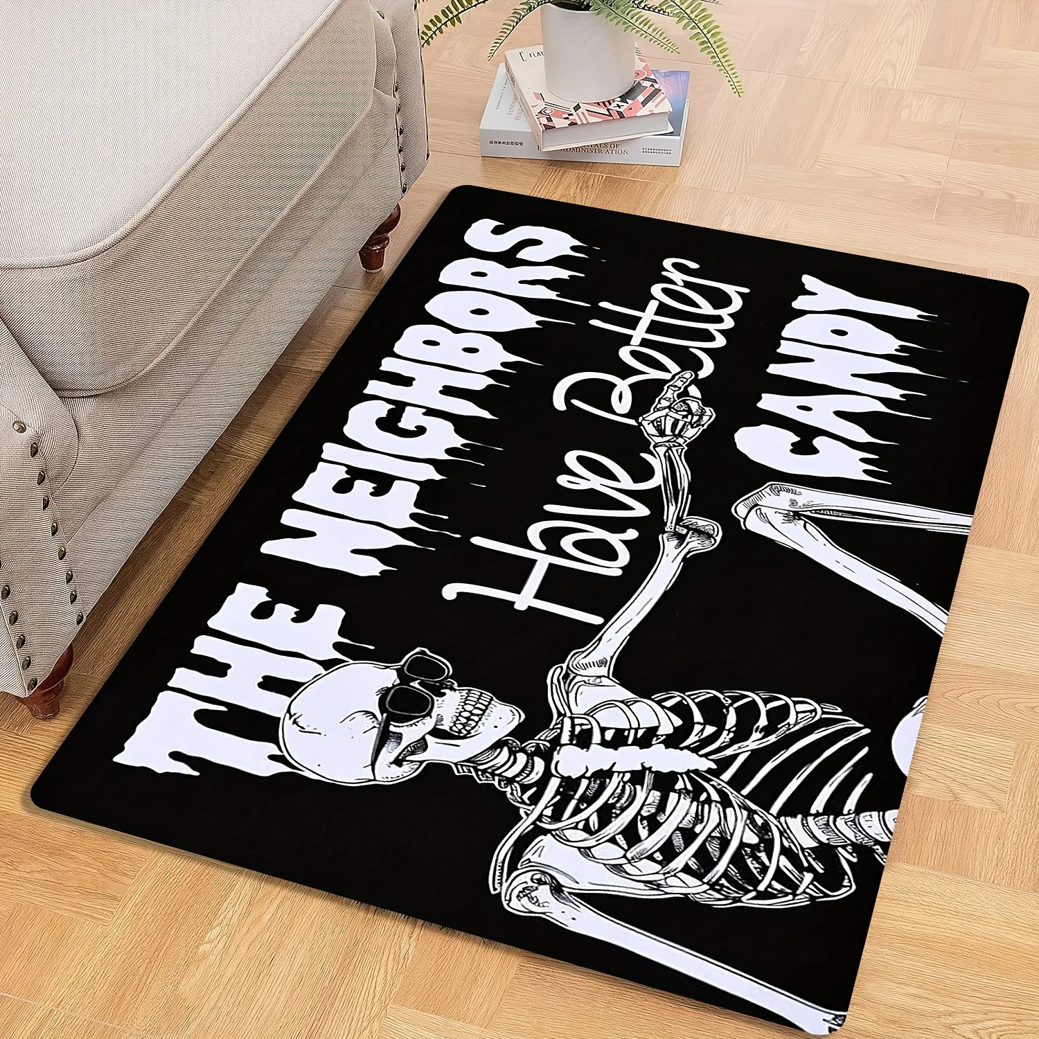 A Halloween Doormat Featuring a Skeleton Welcome Design for Outdoor Entry, with a Fun Message about Better Candy from Neighbor