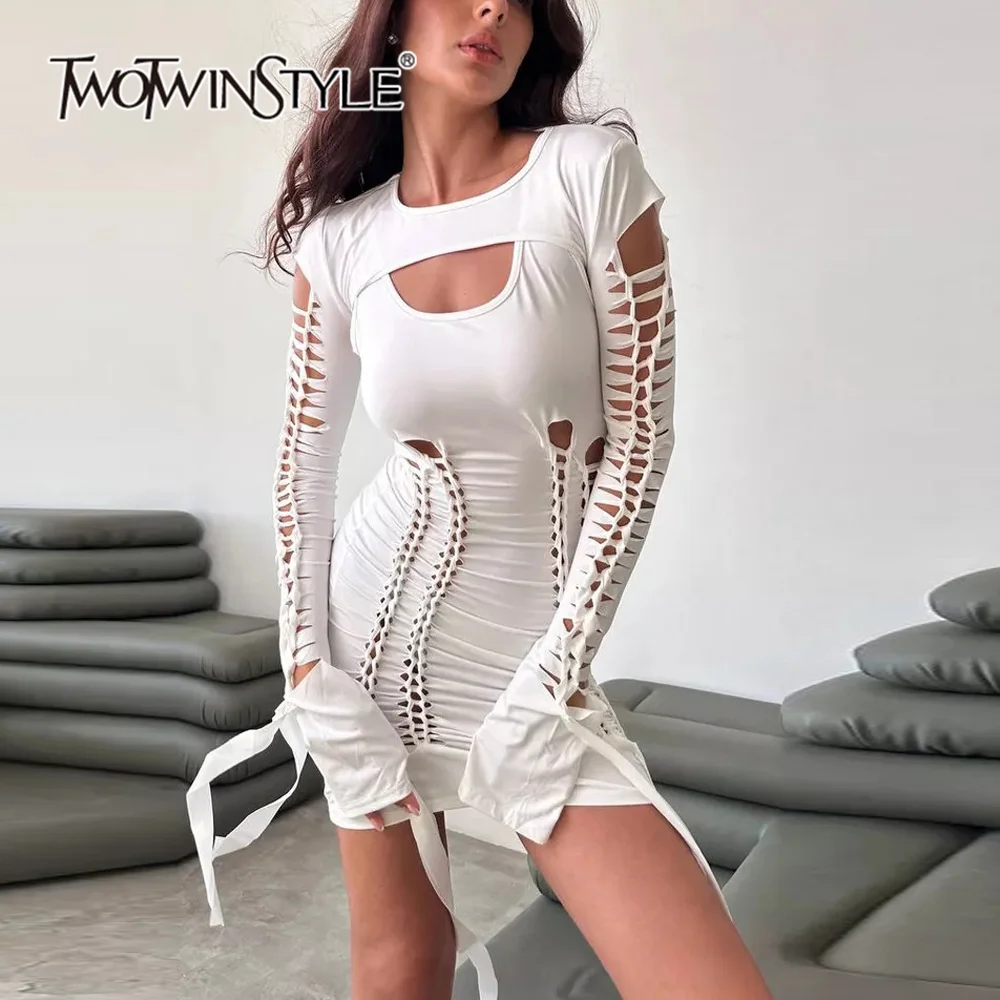 

TWOTWINSTYLE Solid Hollow Out Irregular Dress For Women Round Neck Long Sleeve High Waist Spliced Tassel Sexy Dresses Female New