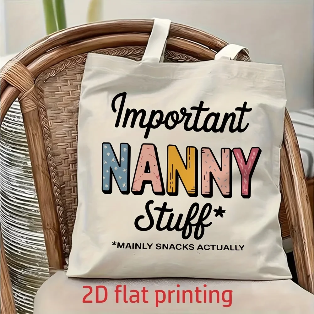 Single-Side Printed Unisex Shoulder Bag 2D flat print featuring the funny text "Essential Nanny Supplies". Foldable & reusable s