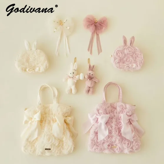 

Japanese New Rose Flower Satin Bow Portable Messenger Bag Sweet Girls Fairy Romantic Cosmetic Bag Cute Doll Pendant