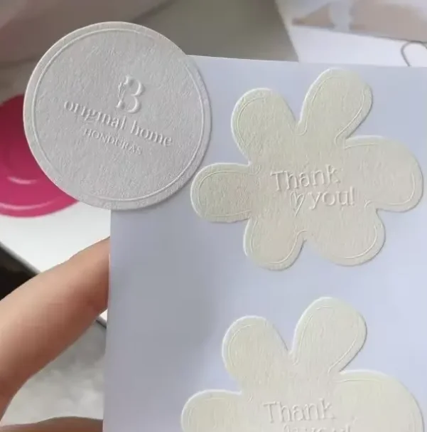 Customized special textured paper embossed stickers with different shapes for packaging and decoration