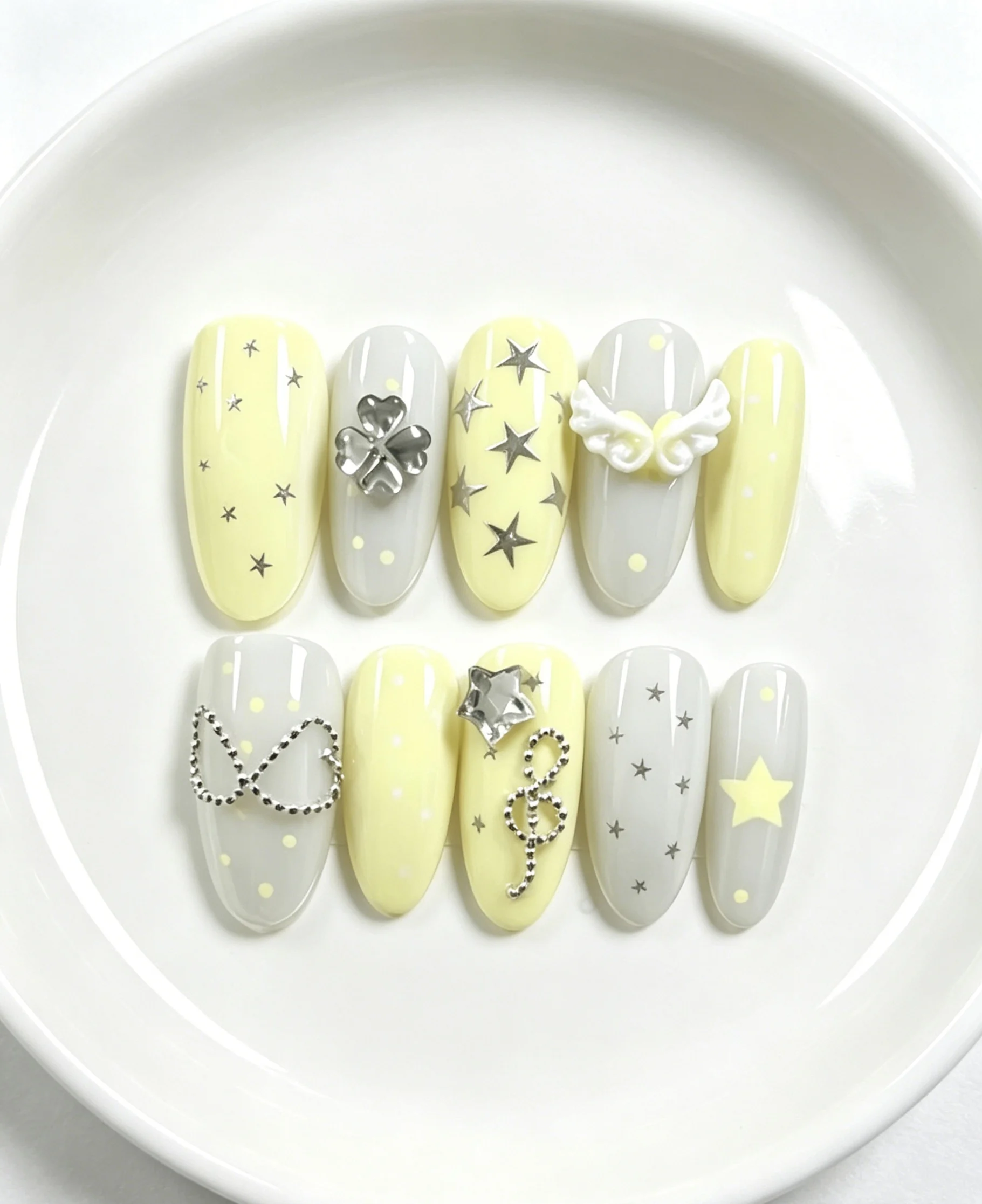 10-Piece Set of Silver Four-Leaf Clover, Musical Note, Heart Chain, Angel Wings, Medium-Long Oval Y2K Girl Handmade Nail Art, Suitable for Campus Daily Wear, Jk Uniforms, Korean-Style Sweet Girl Outfits, Music Festivals, Dates, Outings, Picnics, Shop Visits, and Girl Photoshoots.