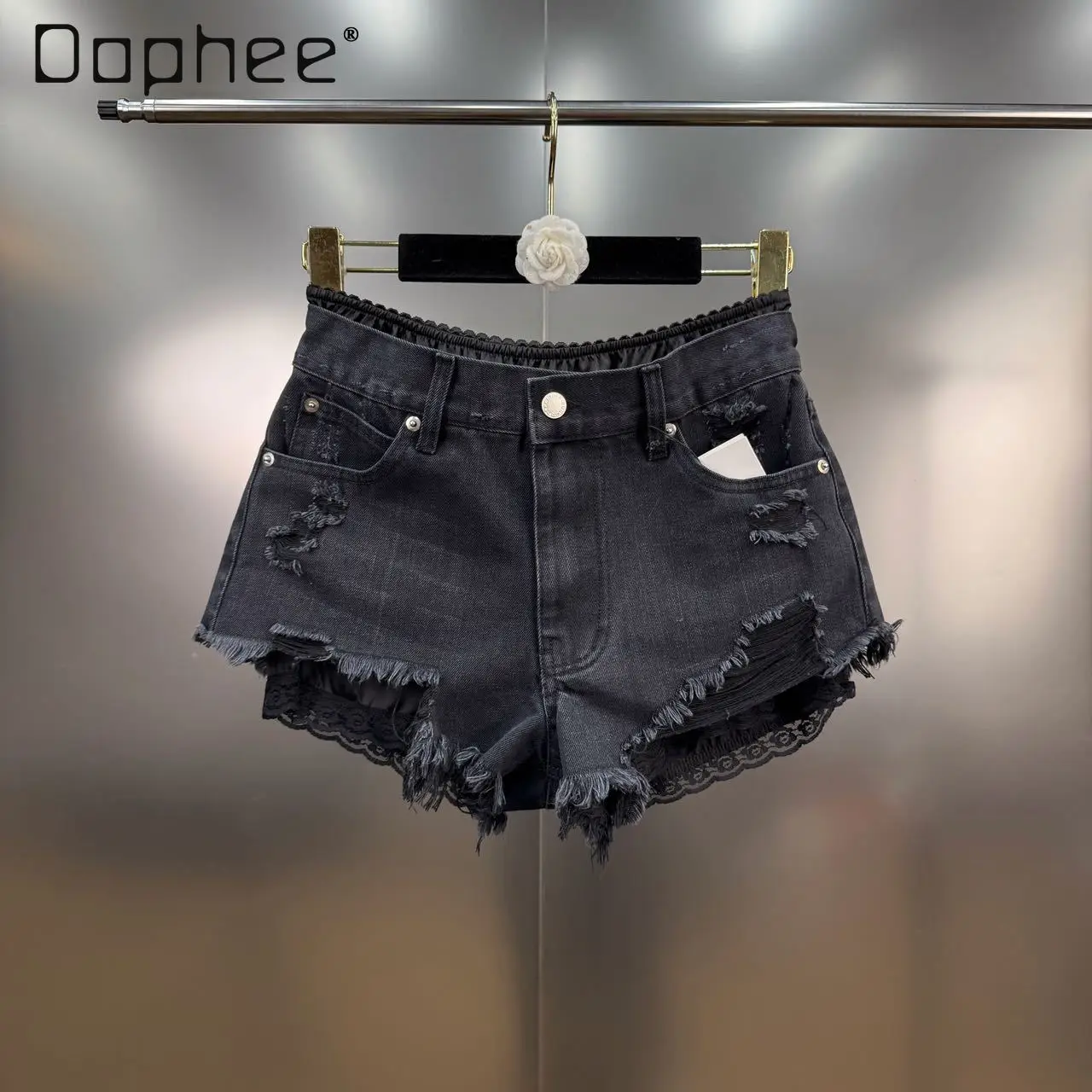 Estate 2025 Nuovo francese retrò pizzo splicing strappato bordo grezzo falso pantaloncini di jeans in due pezzi Spice Girl Y2K jeans slim a vita alta