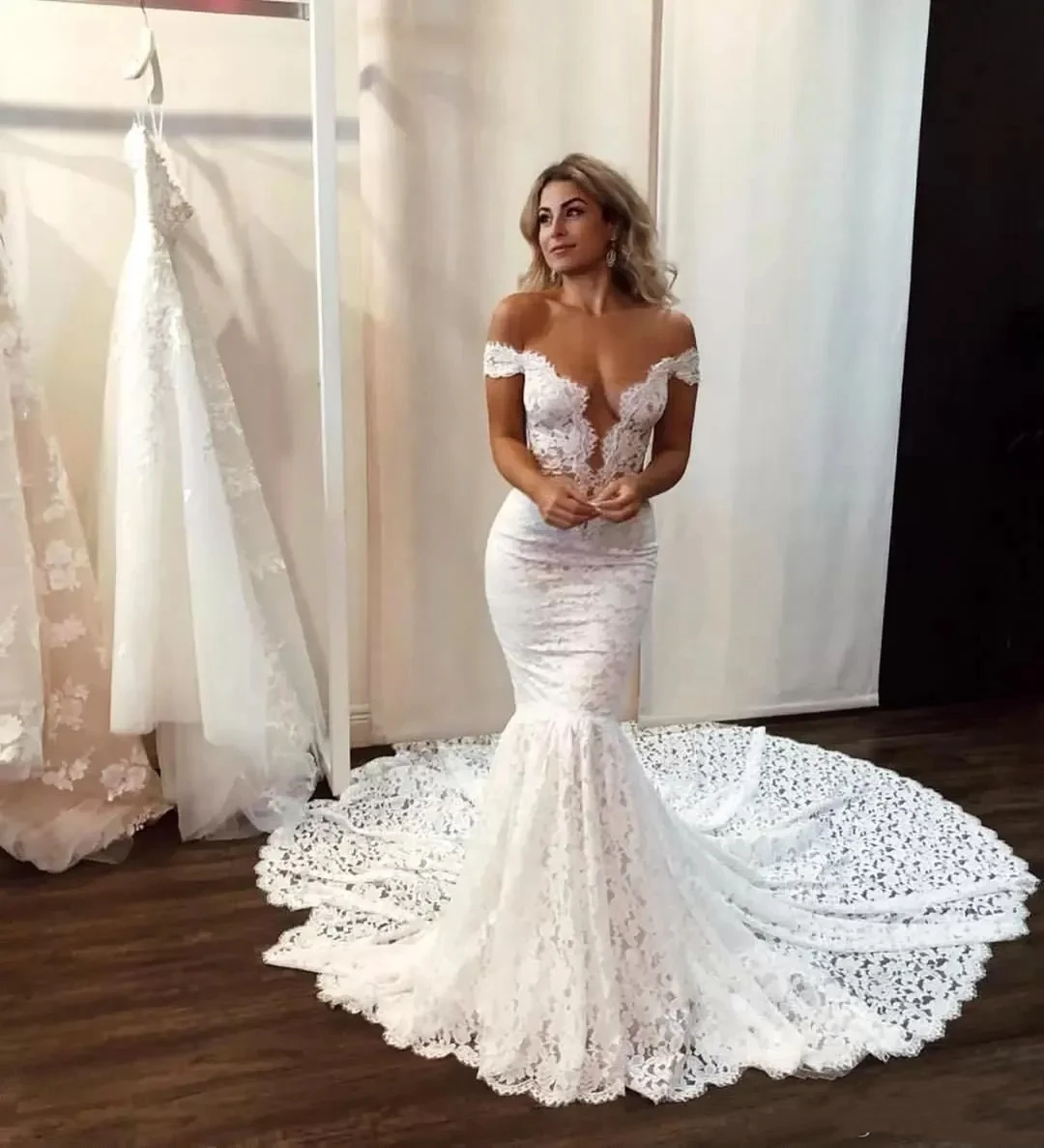 Luxurious and elegant Full mermaid wedding dress sexy sheer backless wrap hips with button long sweep train bridal dress