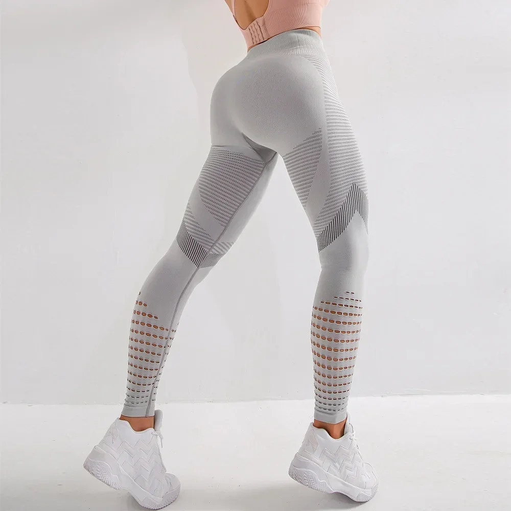 Nuove donne fitness legging a vita alta pantaloni da yoga senza cuciture gamba scava fuori design allenamento da donna corsa legging hip lift