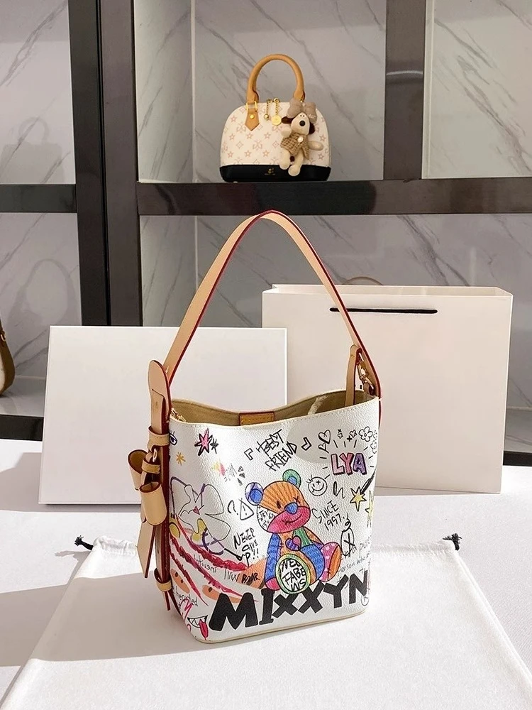 

Popular and Luxury Bucket Bag with Charming Decoration Graffiti Printing Women's Stylish and Versatile Shoulder Crossbody Bag
