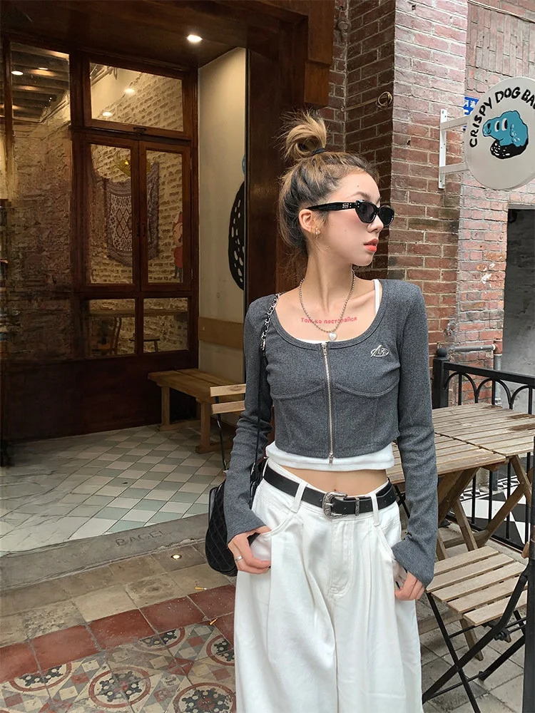 

Женский модный комплект из двух предметов: облегающая футболка с длинным рукавом на двойной молнии и топ с эффектом утяжки талии