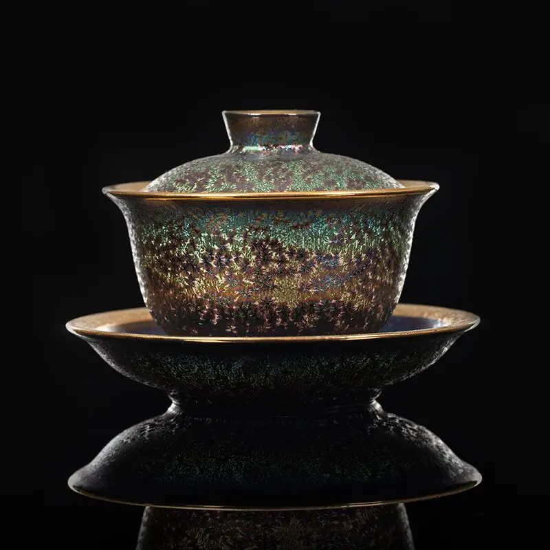 

China's retro ceramic kiln transformed into colorful peacock gilded gold tea bowl large three-talent cover bowl tea set