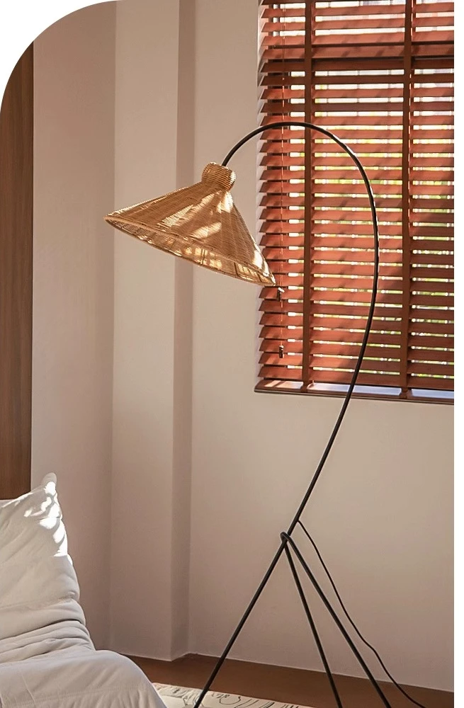 

wabi-sabi wind rattan floor lamp, fishing lamp next to living room sofa, medieval retro art bedroom atmosphere lamp