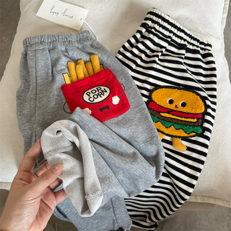

Children's trousers 2025 autumn new boys and girls three-dimensional cartoon sweatpants baby striped straight pants tide