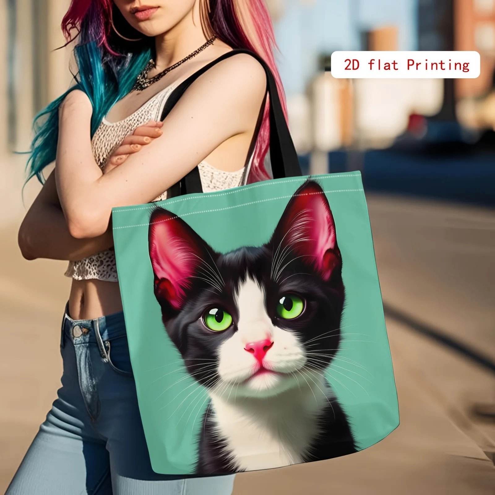 A Stylish 2D Printed Tote Bag Featuring a Cute Black And White Cat with Green Eyes. This Adorable Animal-Themed Tote