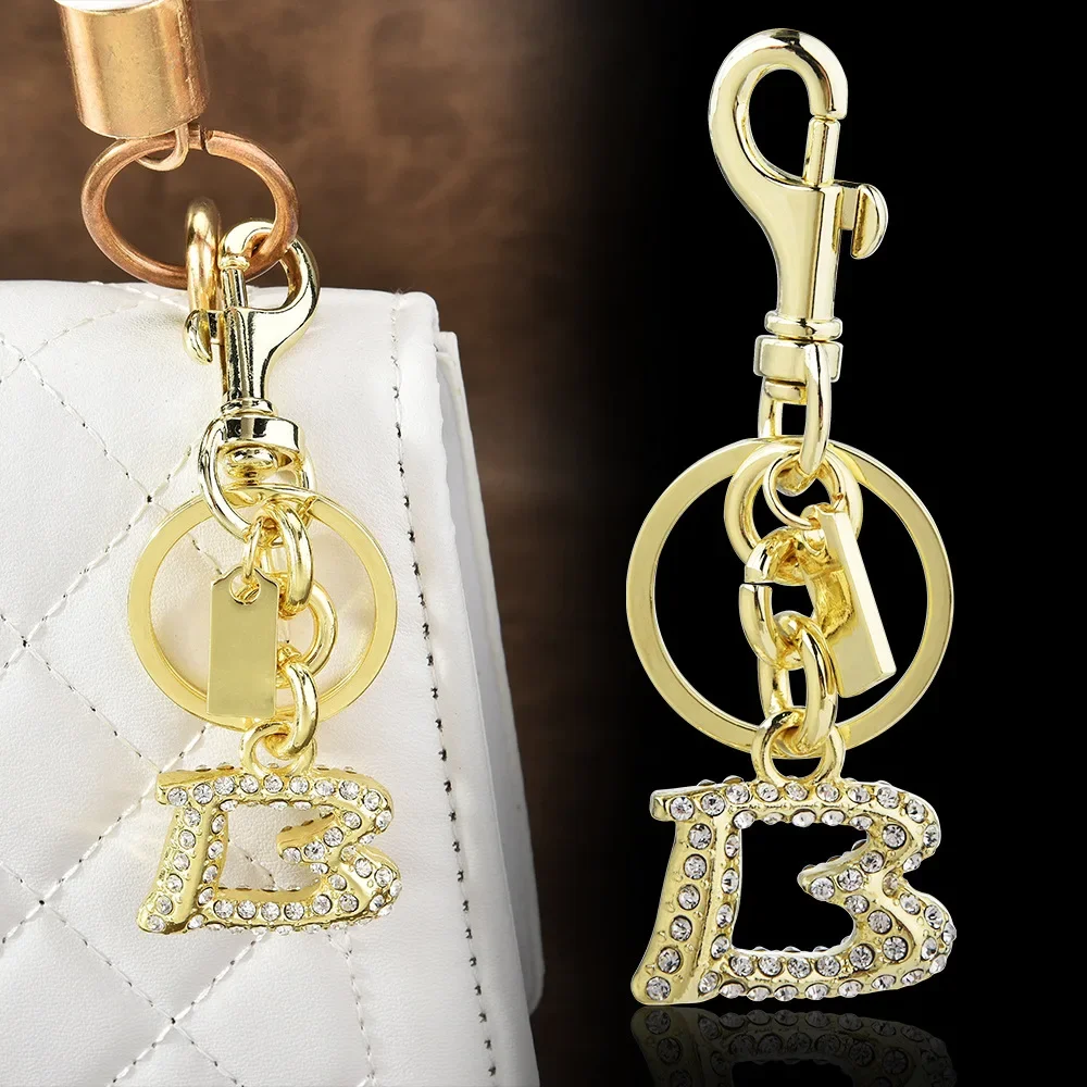 998Hot nowy metalowy, wysadzany diamentami, stylowy wisiorek do torby z angielską literą, brelok, modny i spersonalizowany wisiorek