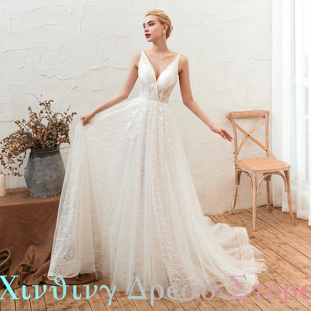 Abiti da sposa a trapezio lunghi fino al pavimento con scollo a V in organza senza maniche Abiti da sposa sexy e alla moda in pizzo Sweep Train Lace Up Back