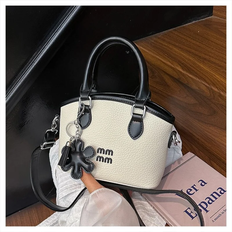 

Верхняя женская сумка из кожи с точечной печатью и Парижская повседневная винтажная просторная мягкая повседневная сумка в современном стиле ​