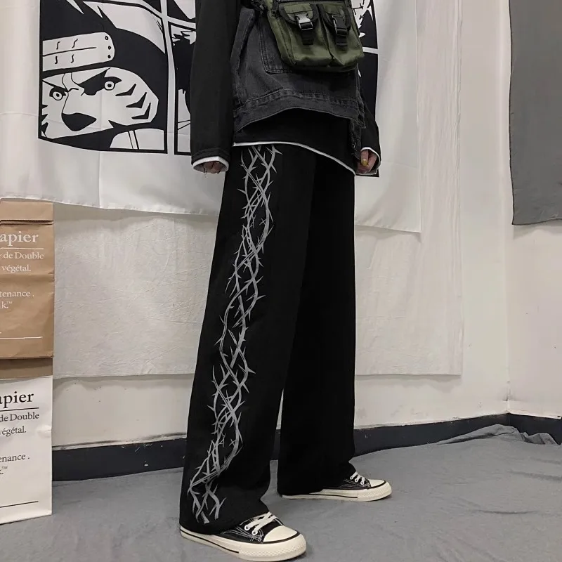 Versione coreana della tendenza di high street retro thorn print Harajuku pantaloni larghi a gamba dritta larghi pantaloni casual