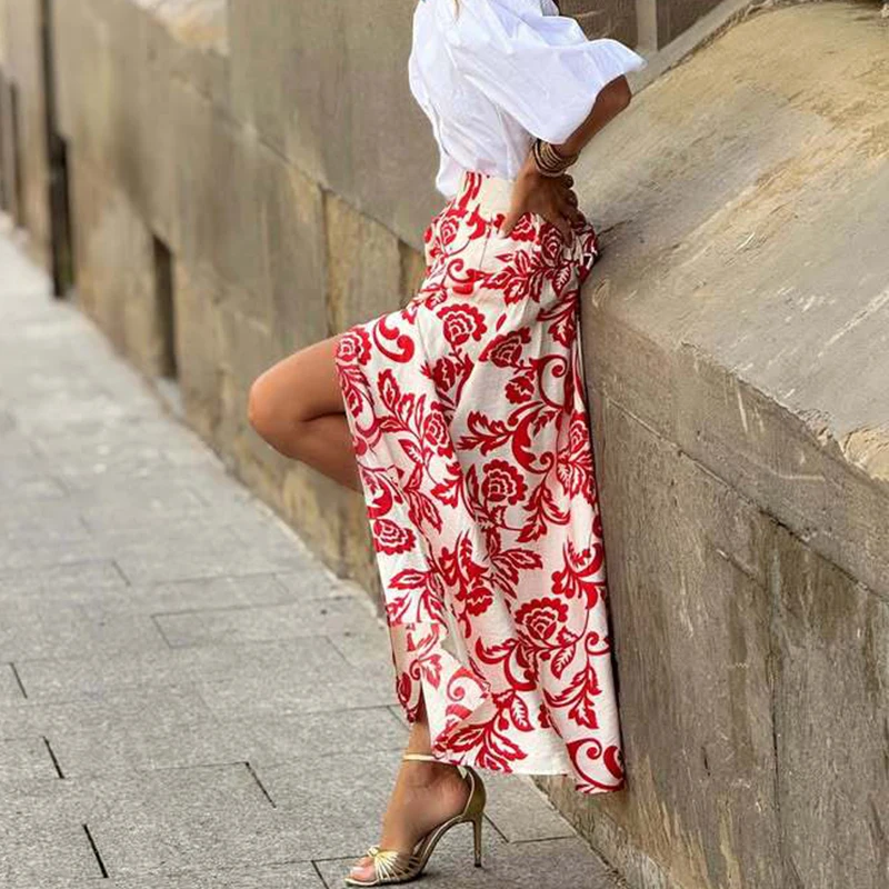 

Повседневные богемные праздничные длинные юбки, новинка 2025, летняя уличная юбка с разрезом и цветочным принтом, офисная женская плиссированная свободная полуюбка