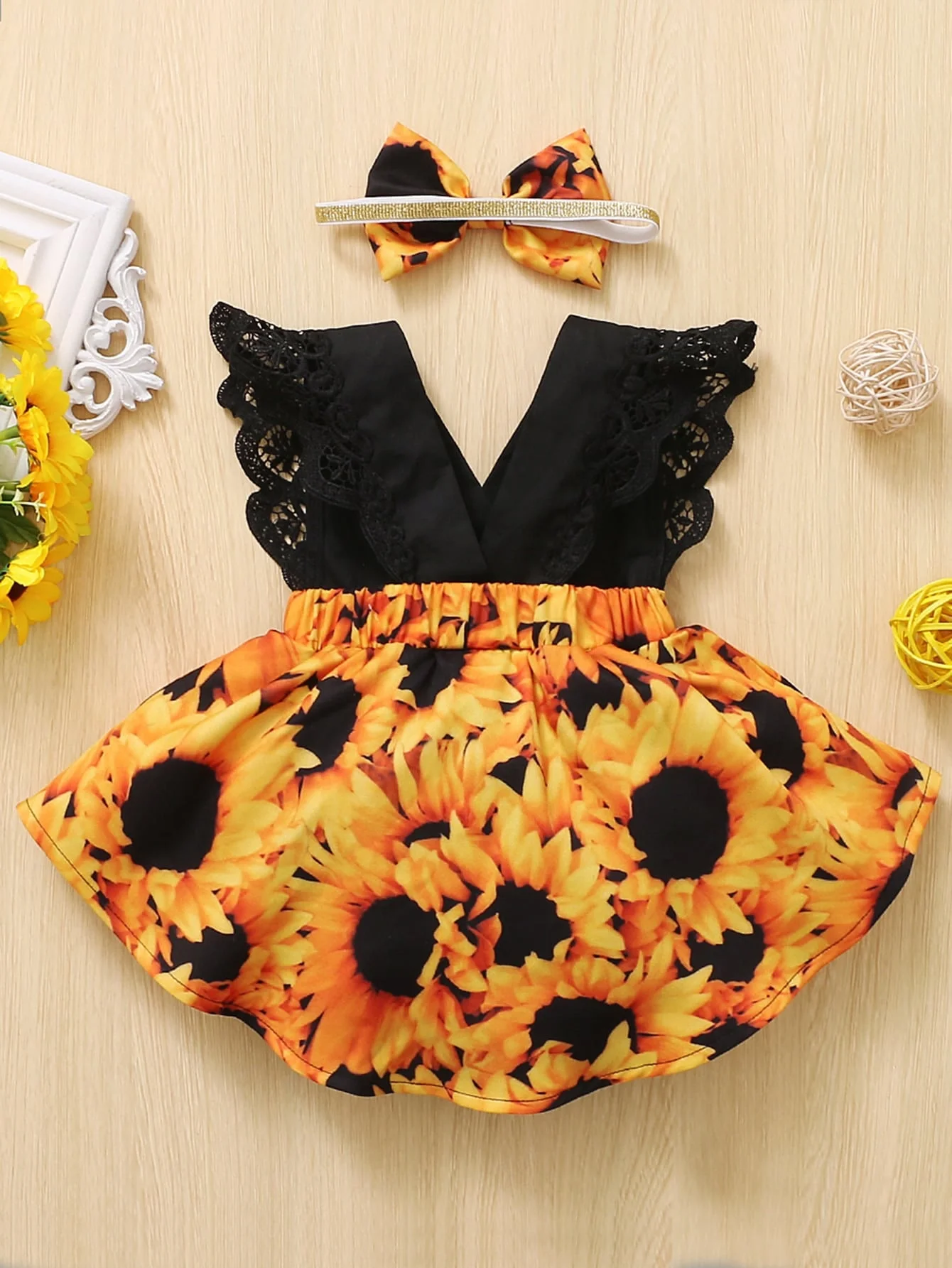 Baby girl black sleeveless lace stitching sunflower print ha-ha dress