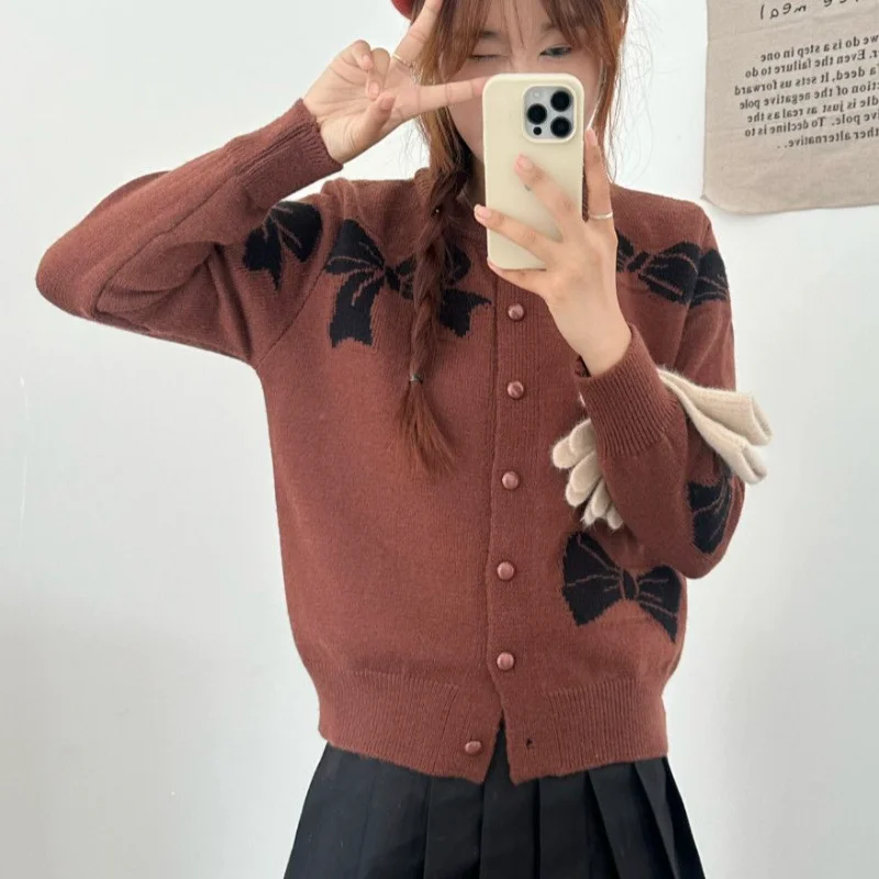 سترة جاكار محبوكة جديدة لربيع وخريف 2025 برقبة دائرية سترة جديدة فضفاضة قصيرة لطيفة