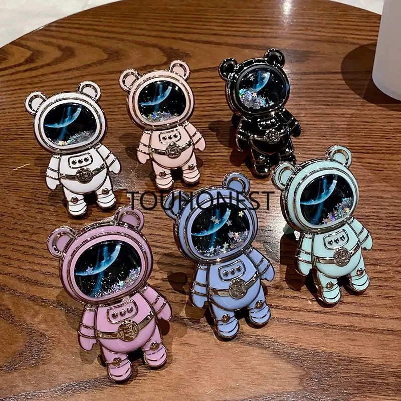 Soporte de escritorio plegable de Anime, soporte de astronauta de arena movediza líquida linda, soporte de teléfono, soporte de dibujos animados