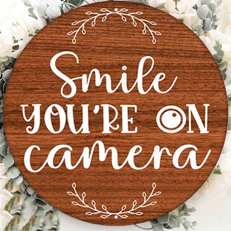 

Round Funny Metal Wreath with Smile Sign, Humorous Aluminum Camera, Warning Decoration, Indoor & Outdoor Use, Weather Resistant