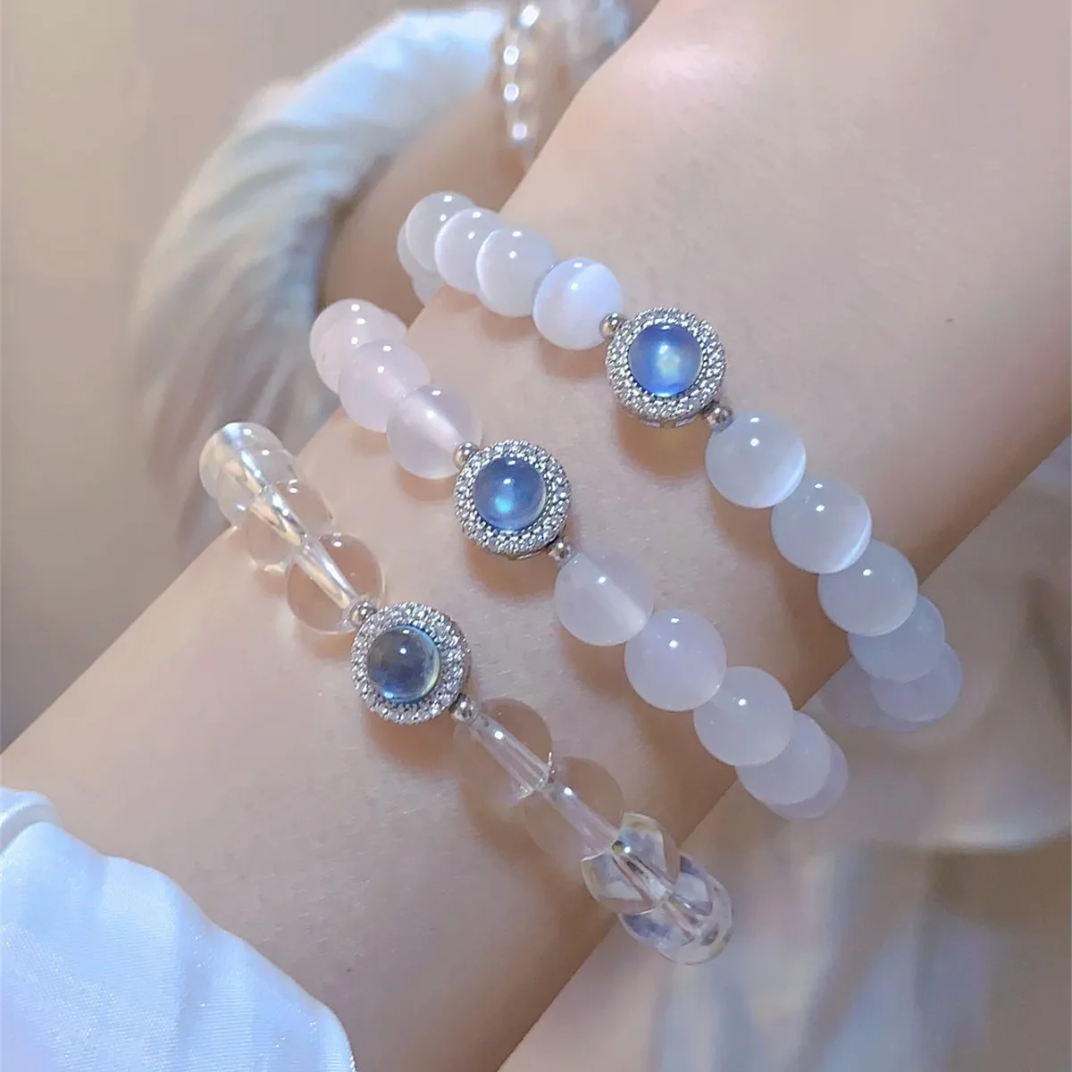 

Sparkling Diamond Sea Blue Treasure White Crystal Cat Eye Stone Crystal French Bracelet Hand String for Women