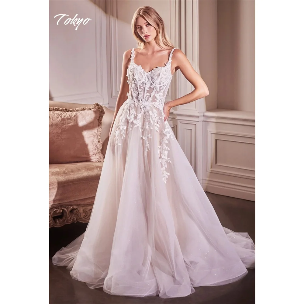 東京カスタムメイドホワイトスパゲッティストラップウェディングドレスノースリーブエレガントチュールブライダルガウンAラインコートトレインウェディングガウン