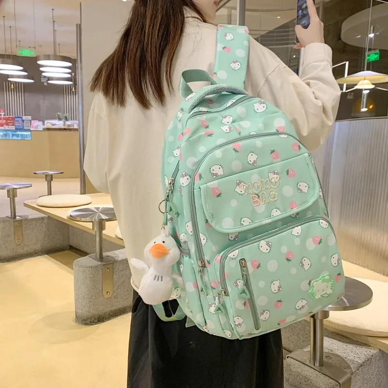 Sanrio Hello Kitty Kawaii Schoolbag Female Large Capacity Lightweight Spine Protecting Shoulder Bag for Fresh College Students