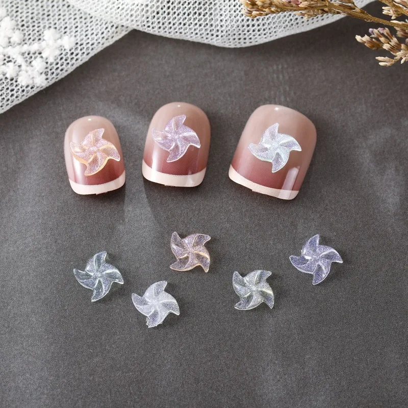 50/100 pièces lumineux moulin à vent forme Nail Art bijoux glace à travers doré couleur résine accessoires Nail Art épingle à cheveux décor accessoire
